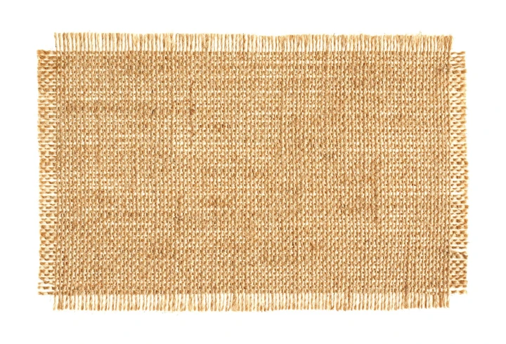Beiges Garn aus Canvas isoliert auf weißem Hintergrund